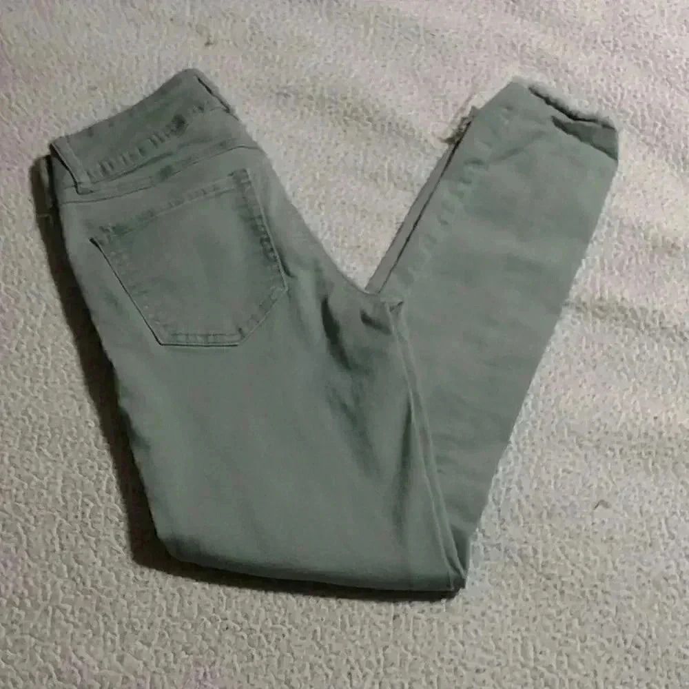 Refuge size 2 distressed jeans with cuff to bottom and gold button